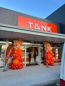 Grand Opening Balloon Columns with Giant Scissors and Ribbon