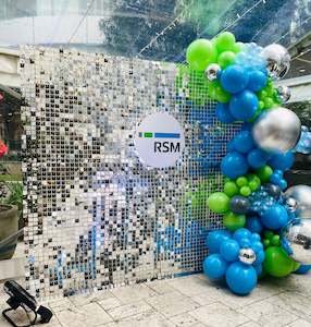 Corporate Shimmer wall Backdrop and balloon garland display