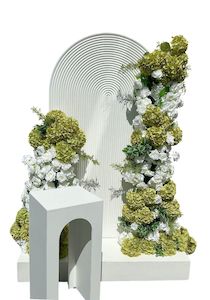 21st Birthday Packages: Green and white floral and ripple backdrop arrangements.