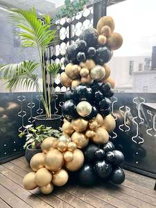 21st Birthday Packages: Black and gold balloon garland grab and go on stand 3m
