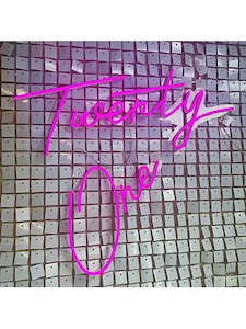 Twenty One neon pink signage hire
