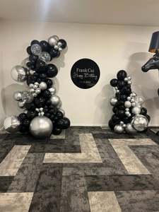 Grab And Go Balloon Garlands: Black and silver inflated balloon garland and hire sign