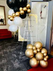 Custom welcome signage and balloons