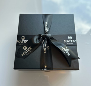 Frontpage: Deluxe gift packaging / MATER Beauty branded gift box with ribbon