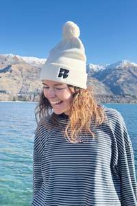 CSS Four Flags Pom Pom Beanie Ecru