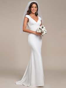 Wedding Gown: Rawiri cap sleeve fitted wedding gown in Ivory or Black