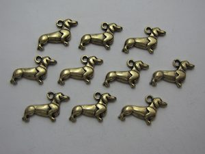 Products: 10 Bronze metal dog charms Beadzone