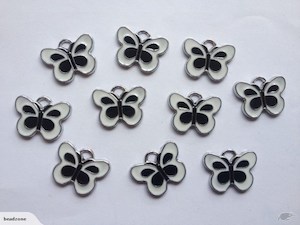 Products: 10 Coloured butterfly charms Beadzone