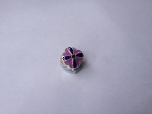 Products: 1 Purple flower charm Beadzone