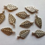 Products: 10 Silver metal leaf charms Beadzone