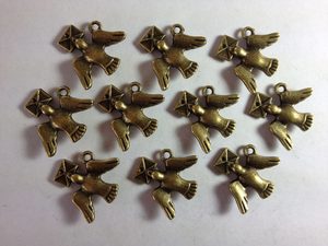 Products: 10 Bronze metal bird charms Beadzone