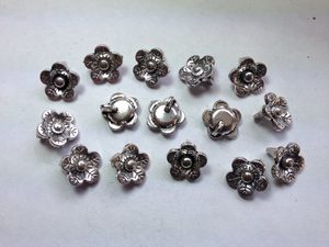 Products: 15 Silver metal flower charms Beadzone