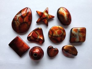 Products: 10 Dark orange black markings Beadzone
