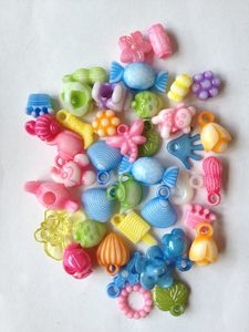 Products: 35 Mixed coloured charms Beadzone