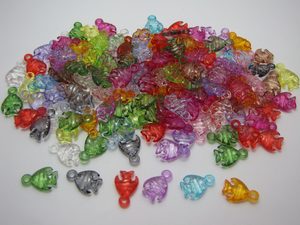 Products: 50 Fish shaped charms Beadzone