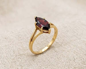 Rings 1: 9K Yellow Gold Marquise Cut Garnet Ring