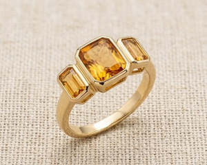 Citrine: 9K Yellow Gold Emerald-Cut Citrine Trilogy Ring