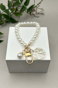 Gift Guide 2023 Bags And Accessories: Pearl key Chain with Shell