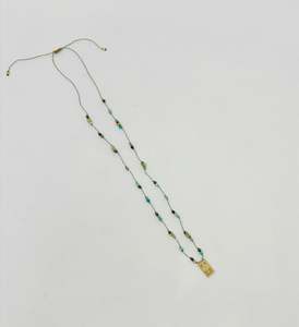 Designer Jewellery: Baby Ubud Lotus Pyrite Turquoise Cord Necklace