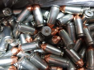 Pistol Ammunition: 40 S&W 165GR CMJ-RN Steel Case (500 rounds)