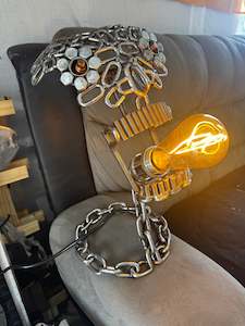 Grinning glow skull lamp