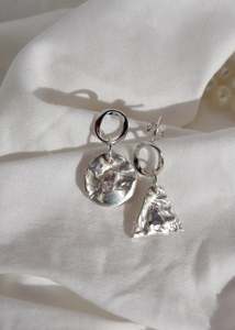 Earrings: Mixed stud earrings- cool tones