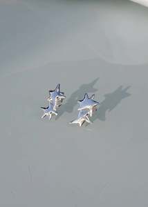 Earrings: Shooting Star stud earrings