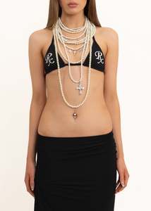 Multi-strand pearl necklace with cross charms