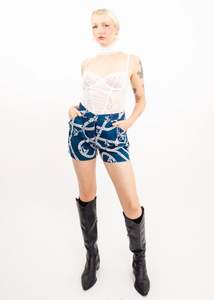 Vintage Shorts: Charm bracelet print denim shorts