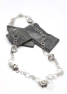 Independent Designer: Sterling silver waist chain with hand sculpted flowers