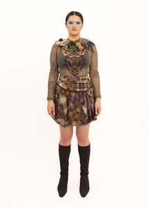 Skirts: Asymmetric clashing tartan skirt