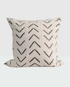 Cushions 1: Cream-colored base and black chevron-style patterns