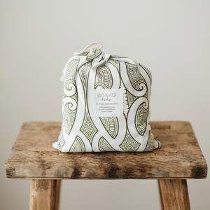 Products: Fitted Cot Sheet | Te Pātiki Green