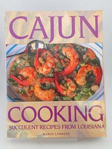 Cooking: Light tanning around page edges. Light foxing inside covers/ ffeps. by Marjie Lambert