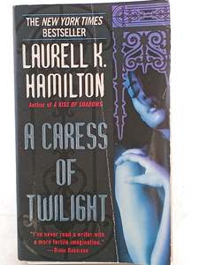 Fantasy: A Caress of Twilight by Laurell K. Hamilton