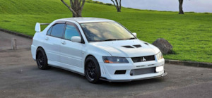 25 Box: Mitsubishi Lancer Evo 7 Front Lip Splitter / Extension - Plastic (2001 - 2003)
