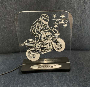 All: Edge lit action picture display on stand