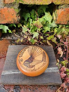 Products: Round Piwakawaka Container - Burnt Offerings