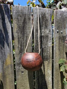 Products: Hanging Coconut Shell - Burnt Offerings