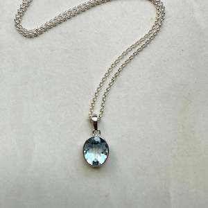 Products: Sterling Silver Oval Cut Blue Topaz Pendant
