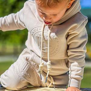 Monogram Embossed Track Pants Kids - Stone