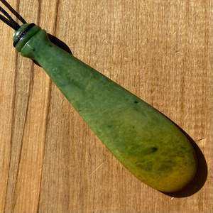 Pounamu Mere: Pounamu Mere Pendant - Marsden Flower Jade