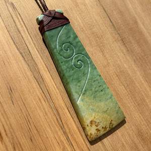 Pounamu Toki Pendants: Marsden Flower Jade Pounamu Toki with Koru Relief
