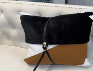 Black, brown nd whtesquare cushion