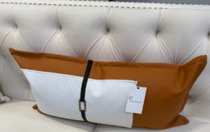 Tan and white rectangle cushion