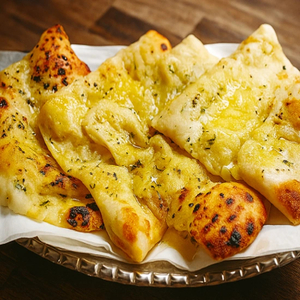 Products: GARLIC & CHEESE / GARLIC & CHILLI NAAN - Chawla’s Manukau