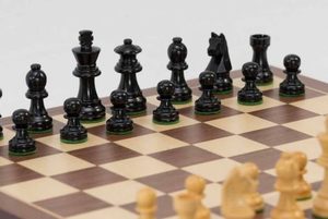 Black Universal Chess Set with Walnut Board. 65mm King