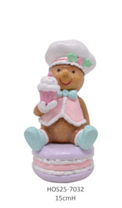 Gingerbread Collection: Pastel Gingerbread Sitting on a Macaroon holding a Cupcake