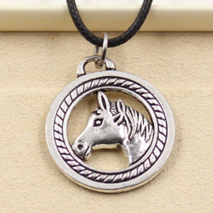Jewelry And Accessories: Black rope necklace with horse head pendant
