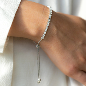 Augusta - 14ct white gold diamond tennis bracelet with a bolo chain slider - Coco Florence